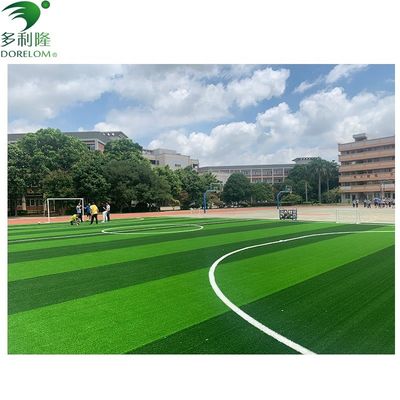 Piastrelle di erba artificiale giallo verde rosso per giardini da calcio e pavimenti sportivi